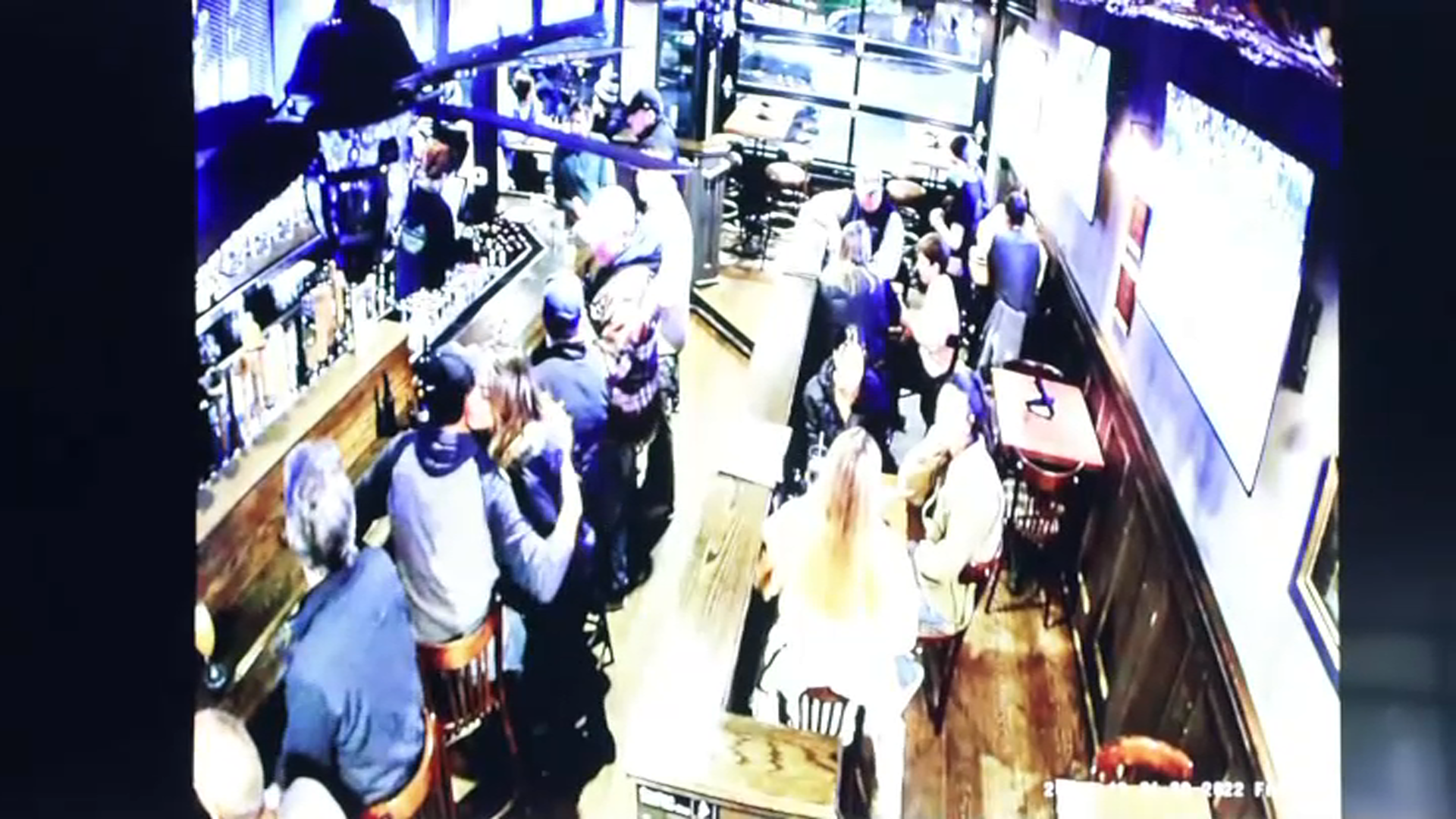 John O'Keefe and Karen Read embrace, bottom left, at Canton, Massachusetts, bar C.F. McCarthy's on the night of Jan. 28, 2022, the night before O'Keefe died. The surveillance footage was shown at Read's murder trial, in Norfolk Superior Court on Wednesday, May 8, 2024.