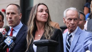 Karen Read stands outside Norfolk Superior Court in Dedham, Massachusetts, after a mistrial was declared in her murder case on Monday, July 1, 2024.