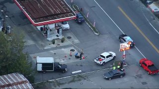 First responders at a gas station on Main Street in Bellingham, Massachusetts, on Friday, Aug. 30, 2024.