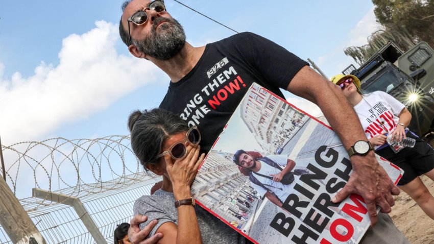 Jonathan Polin and Rachel Goldberg, parents of Israeli hostage Hersh Goldberg-Polin, attend a demonstration by the families of the hostages taken captive in the Gaza Strip since the October 7 attacks by Palestinian militants calling for the hostages’ release, near Kibbutz Nirim in southern Israel by the border with Gaza on August 29, 2024 amid the ongoing conflict in the Palestinian territory between Israel and Hamas. (Photo by JACK GUEZ / AFP) (Photo by JACK GUEZ/AFP via Getty Images)