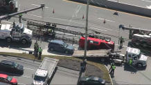 A rolled-over car carrier on Route 9 in Westborough, Massachusetts, on Wednesday, Sept. 11, 2024.