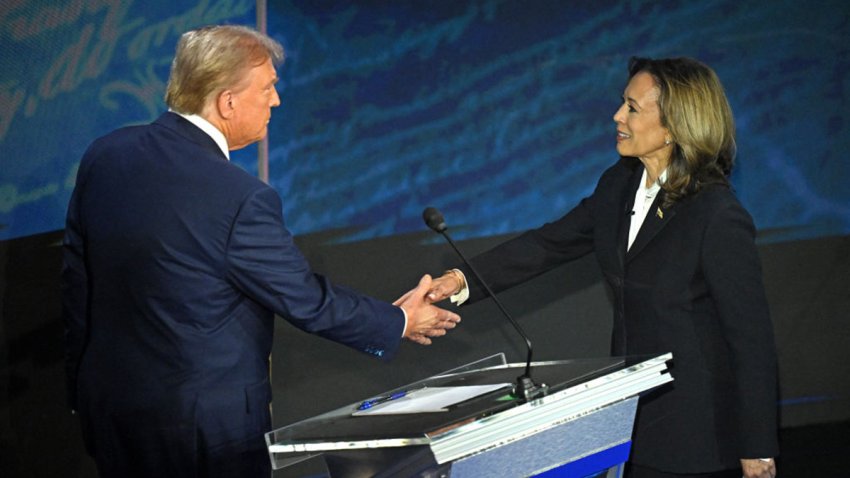 TOPSHOT – US Vice President and Democratic presidential candidate Kamala Harris (R) shakes hands with former US President and Republican presidential candidate Donald Trump during a presidential debate at the National Constitution Center in Philadelphia, Pennsylvania, on September 10, 2024. (Photo by SAUL LOEB / AFP) (Photo by SAUL LOEB/AFP via Getty Images)