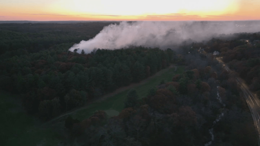 Smoke pouring from a brush fire in Massachusetts.