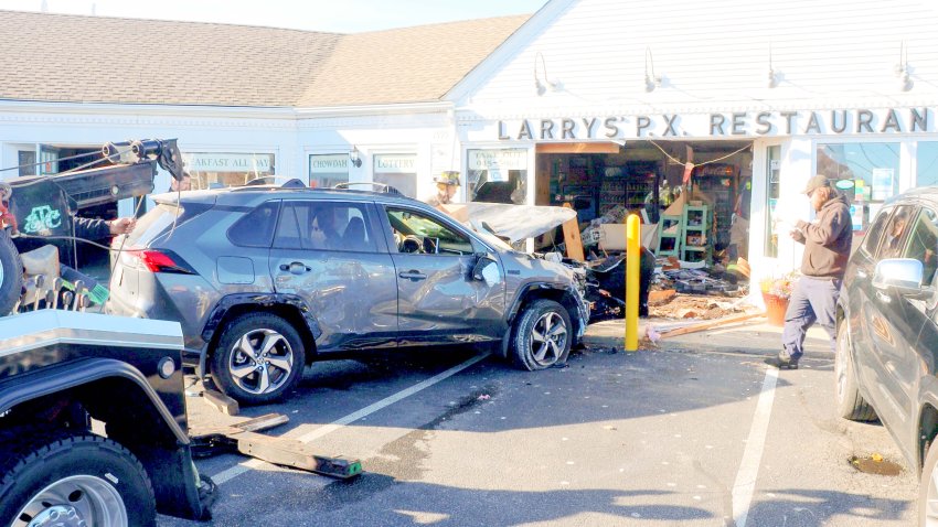 A SUV crashed into Larry’s P.X Restaurant in Chatham, Massachusetts, on Wednesday.