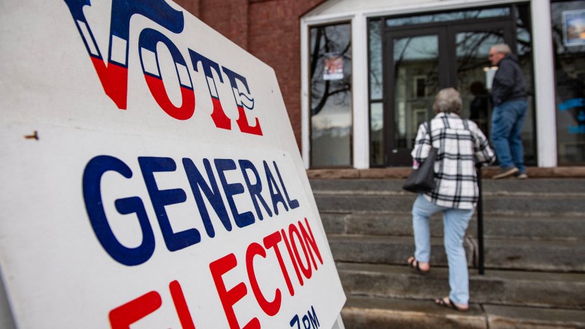 People make their way to vote on Election Day at the town offices in Lancaster, New Hampshire on November 5, 2024. (Photo by Joseph Prezioso / AFP) (Photo by JOSEPH PREZIOSO/AFP via Getty Images)