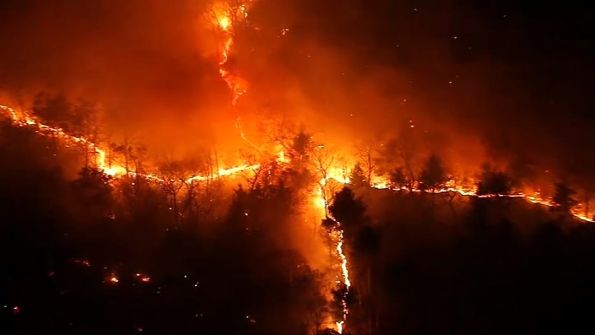 A brush fire burning in Lynn, Massachusetts, on the night of Friday, Nov. 8, 2024.