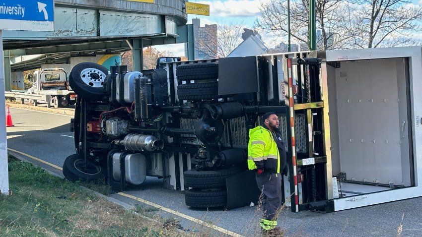 An apparently "Storrowed" truck on its side on Storrow Drive in Boston's Fenway neighborhood Tuesday, Nov. 12, 2024.