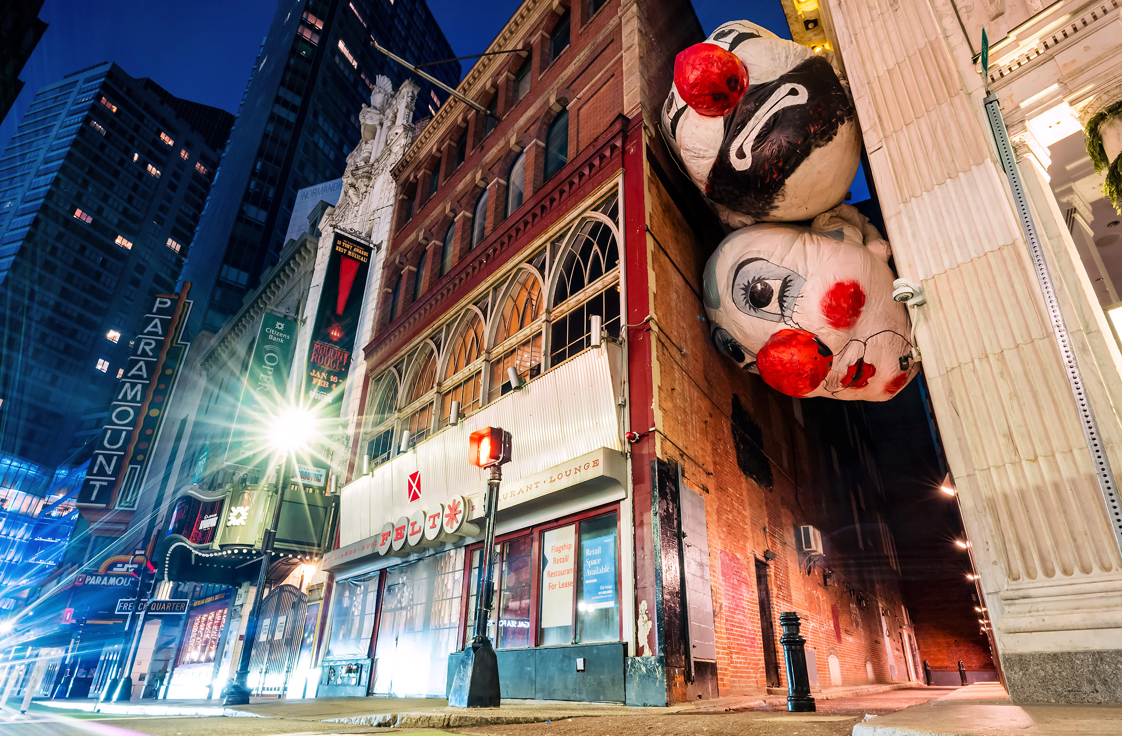 Jan. 12, 2024: In Downtown Crossing, clown heads are part of an art installation from the Downtown Boston Business Improvement District.