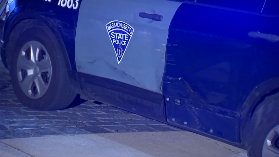 A Massachusetts State Police cruiser with damage in Boston on Friday, Dec. 6, 2024.