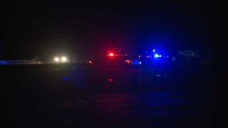 Police cruisers near the scene of a shooting on I-91 in Coventry, Vermont, that involved a U.S. Border Patrol agent on Monday, Jan. 20, 2025.