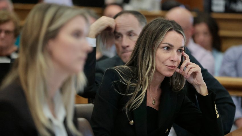 After the jury was dismissed for the day, Karen Read listens as Canton Police Sergeant Michael Lank is questioned by defense attorney Alan Jackson. She is flanked by attorneys Elizabeth Little and David Yannetti. (Photo by Pat Greenhouse/The Boston Globe via Getty Images)