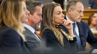 From left: attorney Emily Little, attorney Alan Jackson, Karen Read and attorney David Yannetti in court in Dedham, Massachusetts, on Tuesday, Feb. 25, 2025.