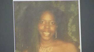 An image of Charline Rosemond displayed at an April 10, 2025, news conference announcing the arrest of a suspect in her 2009 killing.