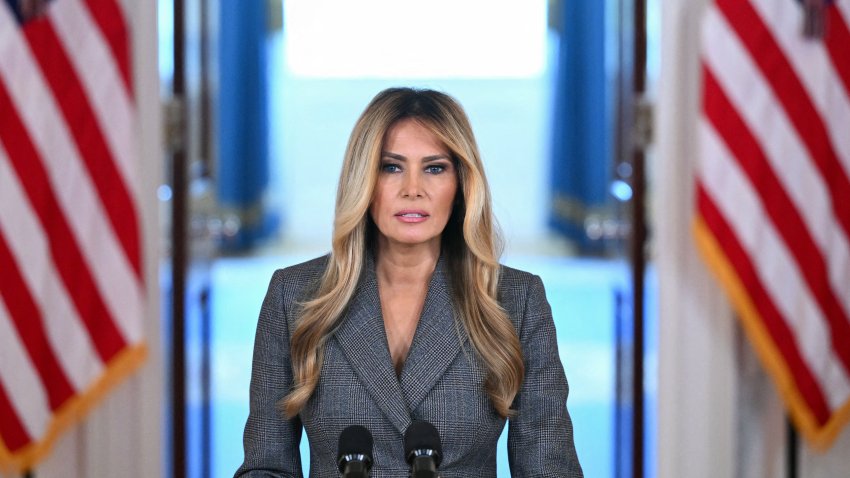 US First Lady Melania Trump speaks in the Cross Hall of the White House in Washington, DC, on April 9, 2026, denying any links to the late convicted sex offender Jeffrey Epstein and his abuse. US First Lady Melania Trump on April 9 made a surprise on-camera statement to deny unspecified allegations about her and convicted sex offender Jeffrey Epstein. "The lies linking me with the disgraceful Jeffrey Epstein need to end today," she said. "The individuals lying about me are devoid of ethical standards, humility and respect." (Photo by Mandel NGAN / AFP via Getty Images)