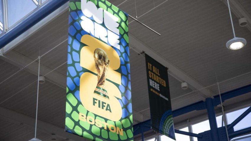 An advertisement for the 2026 men’s World Cup hangs in the MBTA’s Airport station.