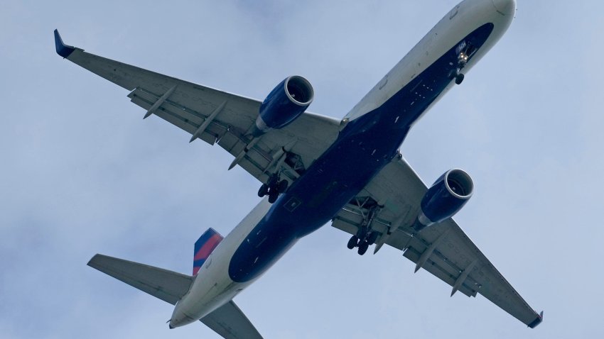 A Delta Air Lines plane flies in to land at Mitchell International Airport in Milwaukee in this file photo from May 22, 2024.