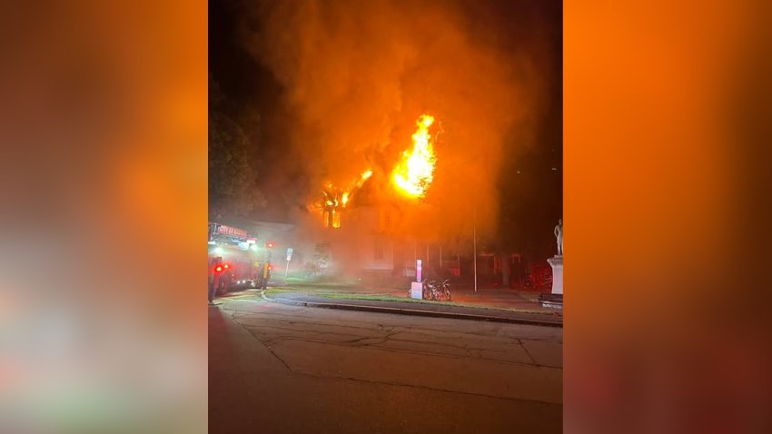 Flames from a fire in Nashua, New Hampshire, on July 21, 2026.