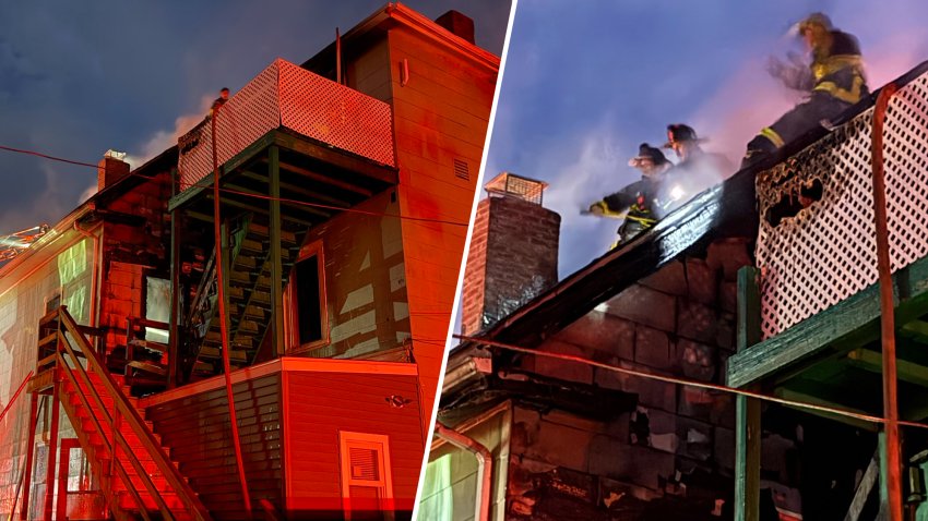 A split screen image. One shows a smoldering two-story wood home in a wide shot. The second shows firefighters on the roof of the same home.