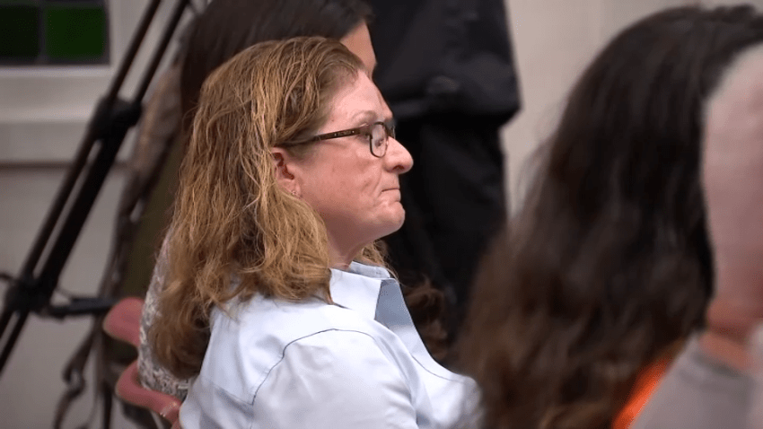 Stoughton Police Chief Donna McNamara at a select board meeting on Wednesday, July 29, 2026, after the board announced she'd be placed on paid administrative leave, along with Town Manager Thomas Calter, amid an outside investigators.