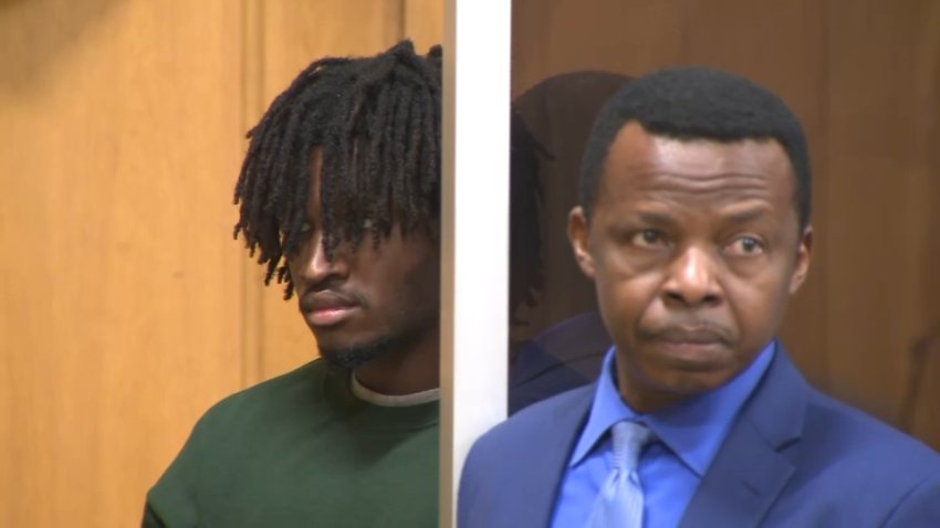 Chukuwnonso Uzoma-eze, at left, in a Massachusetts court on Monday, Sept. 21, 2026, for an extradition hearing connected to the death of Marvins Antoine in Providence.